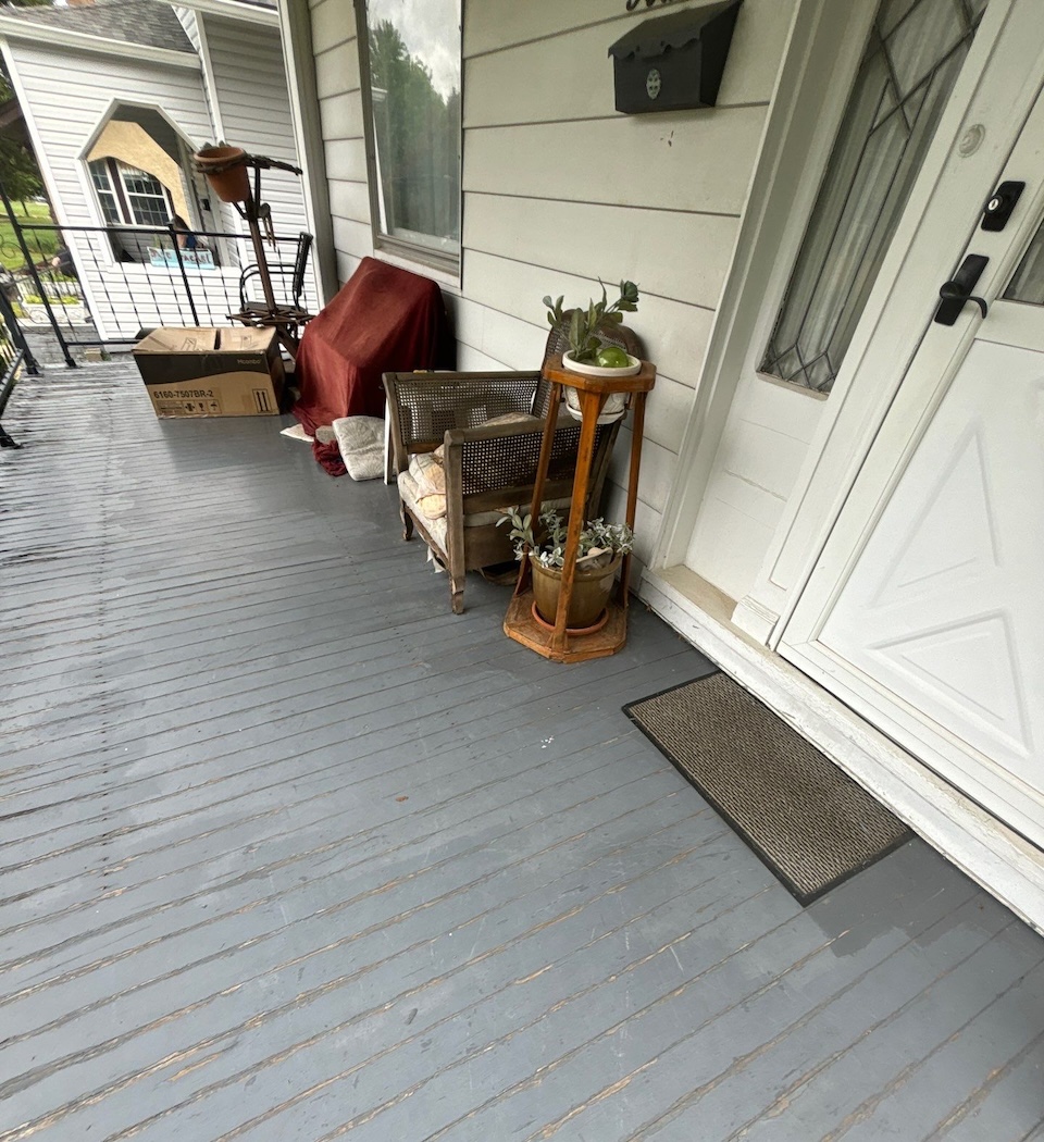 Porch with old porch boards.